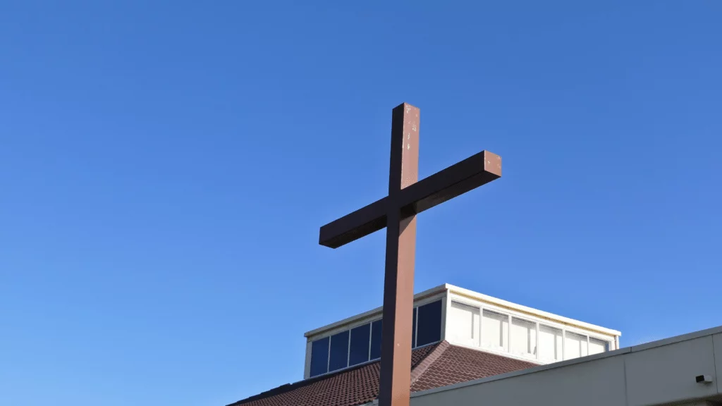 Cross on top of a building:church
