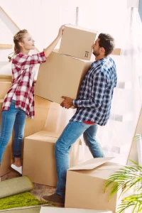 Couple  packing items for self storage in Harlem